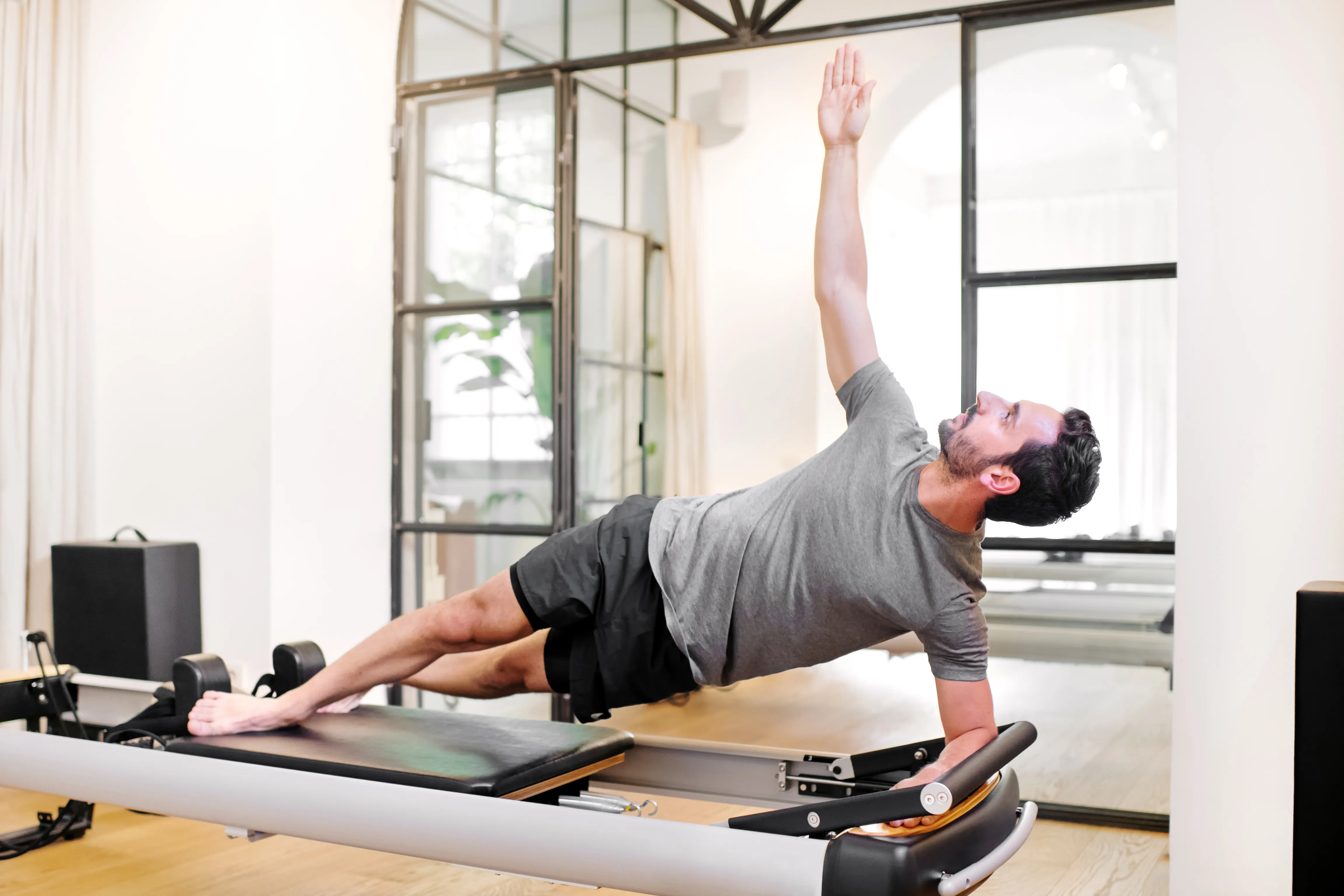 Focused Pilates movement at FlowHaus